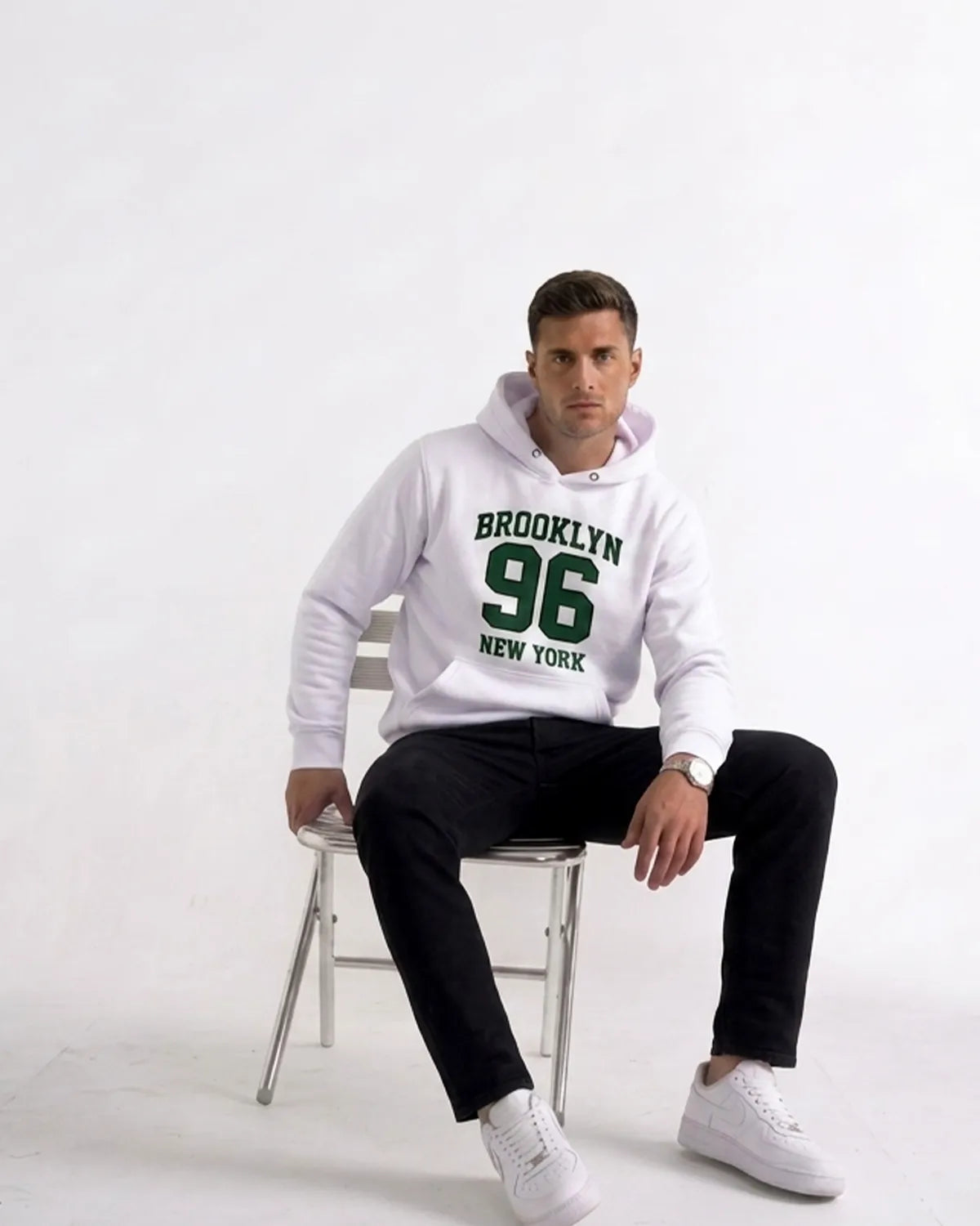 New York Brooklyn hoodie with bold varsity-style print, adjustable hood, durable fabric blend, and casual everyday comfort.